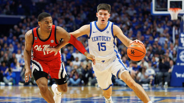 Feb 13, 2024; Lexington, Kentucky, USA; Kentucky Wildcats guard Reed Sheppard (15) drives to the basket around Ole Miss Rebels guard Matthew Murrell (11) during the second half at Rupp Arena at Central Bank Center. Mandatory Credit: Jordan Prather-USA TODAY Sports
