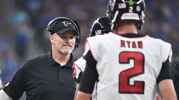 Sep 24, 2017; Detroit, MI, USA; Atlanta Falcons head coach Dan Quinn high fives quarterback Matt Ryan (2) during the fourth quarter against the Detroit Lions at Ford Field.