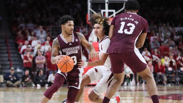 Feb 11, 2023; Fayetteville, Arkansas, USA; Mississippi State Bulldogs guard Shakeel Moore (3) dribbles against Arkansas Razorbacks guard Anthony Black (0) as Bulldogs forward Will McNair Jr (13) sets a screen during the second half at Bud Walton Arena. The Bulldogs won 70-64. Mandatory Credit: Nelson Chenault-USA TODAY Sports