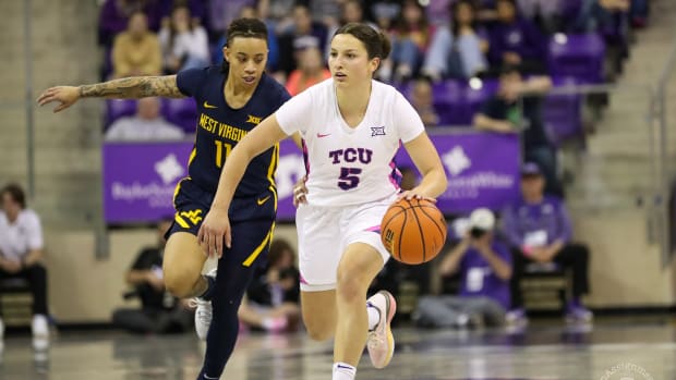 TCU guard Una Jovanovic drives toward the basket during the game against West Virginia.