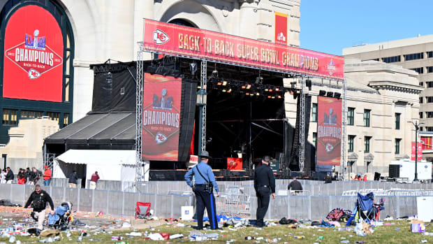 Feb 14, 2024; Kansas City, MO, USA; Police clear the area after shots were fired after the celebration of the Kansas City Chiefs winning Super Bowl LVIII. Mandatory Credit: David Rainey-USA TODAY Sports  