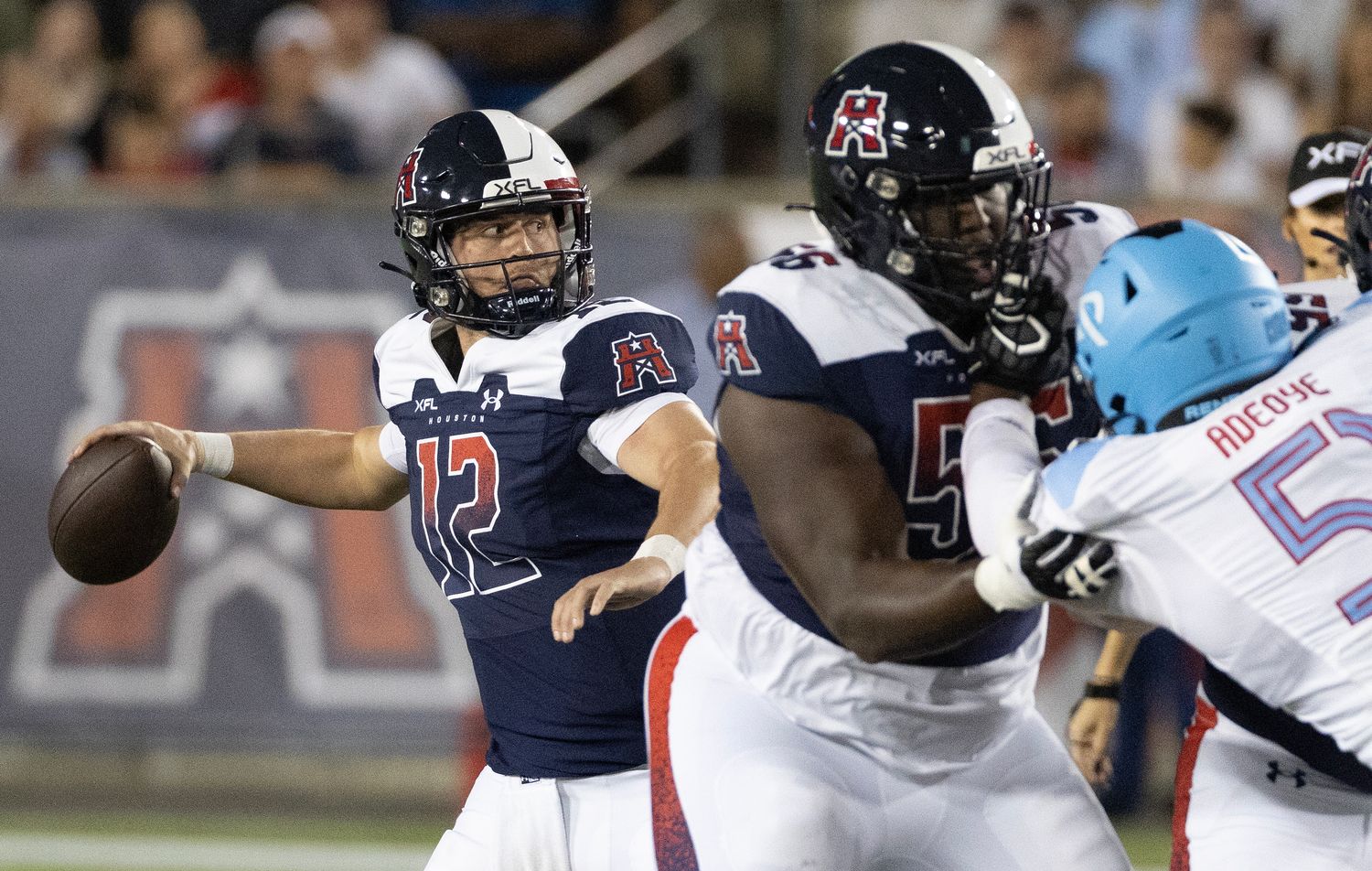 Feb 26, 2023; Houston, TX, USA; Houston Roughnecks quarterback Brandon Silvers (12) drops back to pass against the Arlington Renegades in the first quarter at TDECU Stadium. Mandatory Credit: Thomas Shea-USA TODAY Sports  