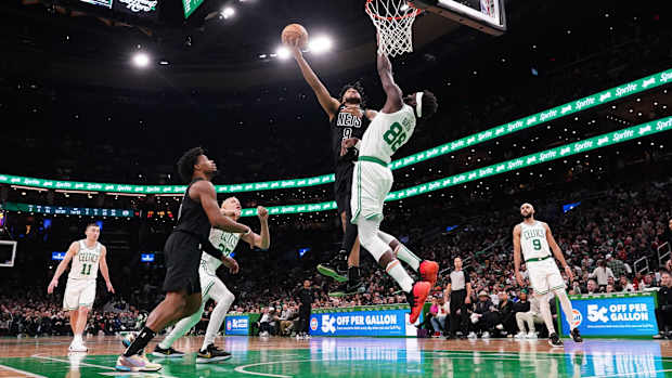  Brooklyn Nets forward Trendon Watford (9) shoots against Boston Celtics center Neemias Queta (88) in the second half at TD Garden.