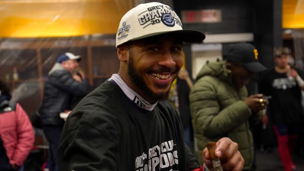 Nov 19, 2023; Hamilton, Ontario, CAN; Montreal Alouettes defensive back Ciante Evans (4) celebrate by smoking a cigar after winning the 110th Grey Cup against the Winnipeg Blue Bombers at Tim Hortons Field. Mandatory Credit: John E. Sokolowski-USA TODAY Sports  