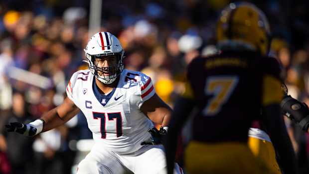 Arizona Wildcats offensive lineman Jordan Morgan (77) against the Arizona State Sun Devils during the Territorial Cup at Mountain America Stadium.