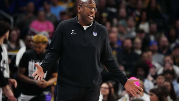 Feb 14, 2024; Denver, Colorado, USA; Sacramento Kings head coach Mike Brown reacts in the first half against the Denver Nuggets at Ball Arena. Mandatory Credit: Ron Chenoy-USA TODAY Sports  