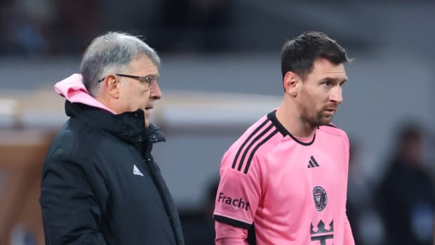 Inter Miami head coach Gerardo Martino (left) and club captain Lionel Messi pictured in February 2024 during a pre-season game in Japan