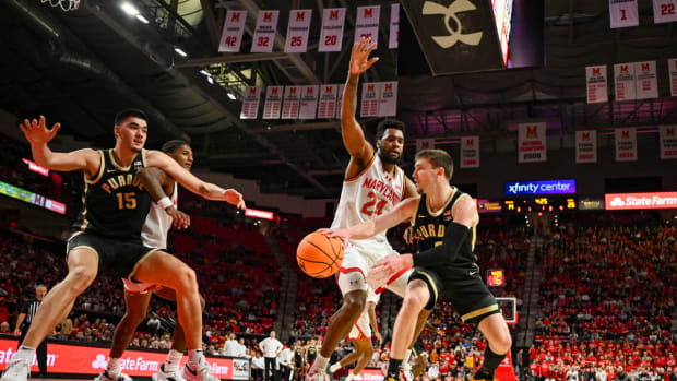 Purdue Boilermakers guard Braden Smith (3) passes to center Zach Edey (15) in the paint during the fist half against the Maryland Terrapins at Xfinity Center.
