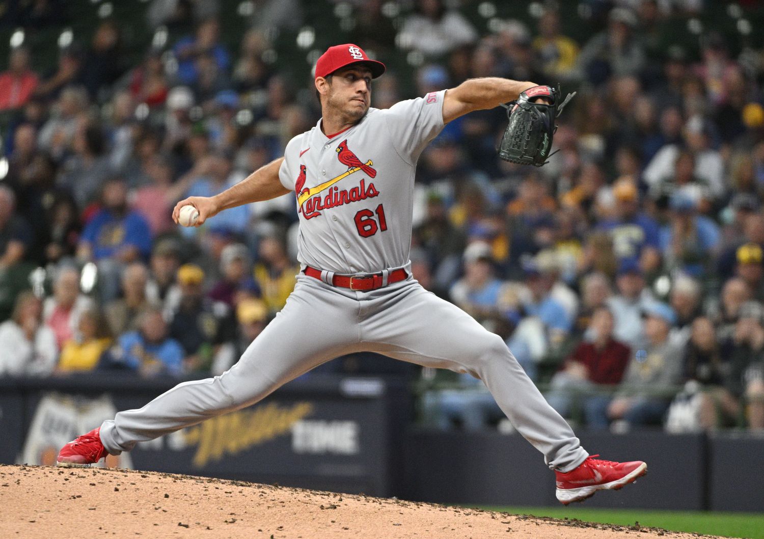 Sep 28, 2023; Milwaukee, Wisconsin, USA; St. Louis Cardinals relief pitcher Jacob Barnes (61) delivers a pitch against the Milwaukee Brewers in the seventh inning at American Family Field.