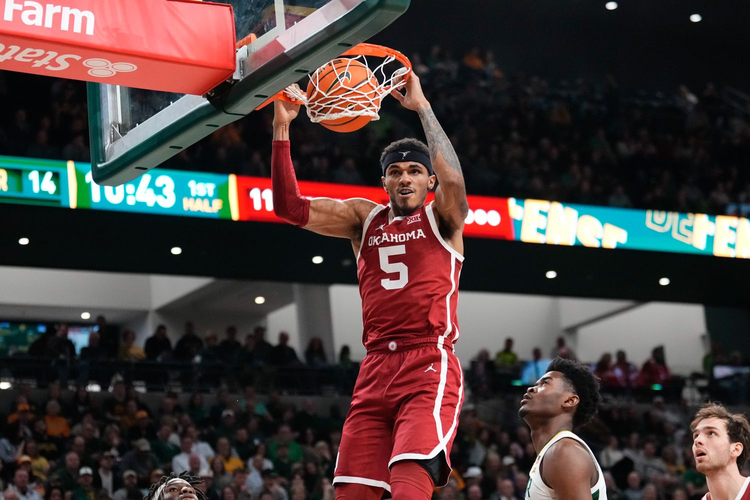 Feb 13, 2024; Waco, Texas, USA; Oklahoma Sooners guard Rivaldo Soares (5) dunks the ball against the Baylor Bears during the first half at Paul and Alejandra Foster Pavilion.