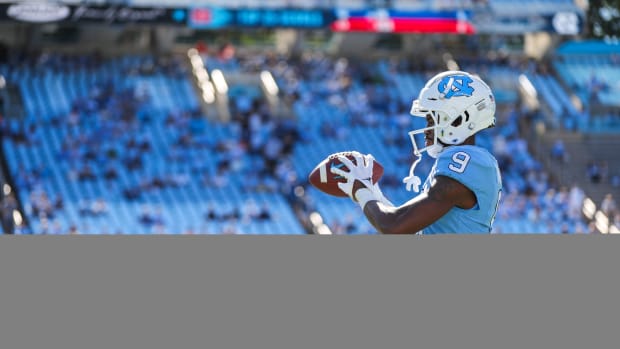 North Carolina Tar Heels wide receiver Devontez Walker (9) warms up before the game against the Syracuse Orange at Kenan Memorial Stadium.