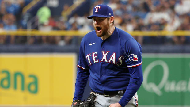 Oct 3, 2023; St. Petersburg, Florida, USA; Texas Rangers starting pitcher Jordan Montgomery (52) reacts after striking out Tampa Bay Rays pinch hitter Junior Caminero (1) to end the seventh inning during game one of the Wildcard series for the 2023 MLB playoffs at Tropicana Field. Mandatory Credit: Kim Klement Neitzel-USA TODAY Sports