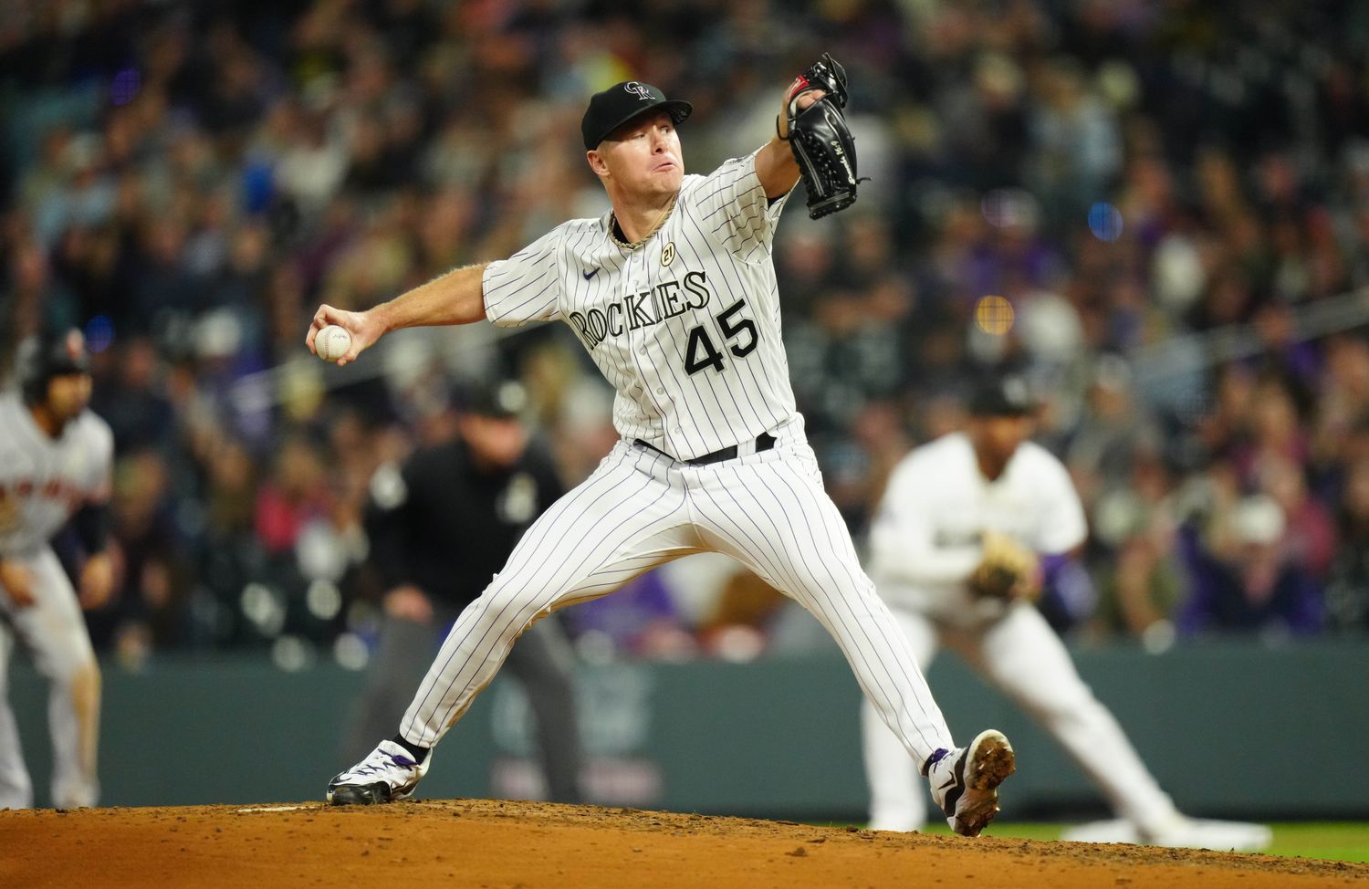 Sep 15, 2023; Denver, Colorado, USA; Colorado Rockies starting pitcher Chase Anderson (45) delivers a pitch in the seventh inning against the San Francisco Giants at Coors Field.