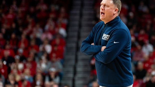 Penn State men's basketball coach Mike Rhoades instructs his team during a Big Ten game at the Nebraska Cornhuskers.