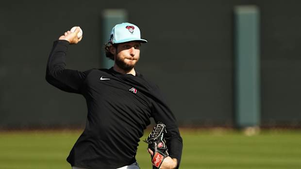 Zac Gallen throwing as part of workouts at Salt River Fields.