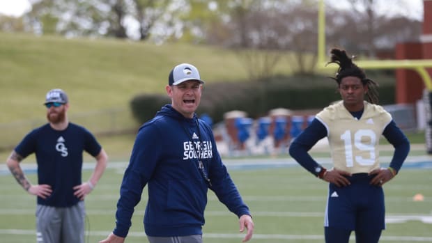 Georgia Southern offensive coordinator/quarterbacks coach Bryan Ellis directs the quarterbacks during practice.