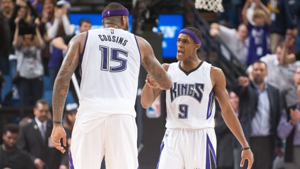 Jan 21, 2016; Sacramento, CA, USA; Sacramento Kings center DeMarcus Cousins (15) and guard Rajon Rondo (9) celebrate after scoring against the Atlanta Hawks during the fourth quarter at Sleep Train Arena. The Sacramento Kings defeated the Atlanta Hawks 91-88. Mandatory Credit: Ed Szczepanski-USA TODAY Sports  