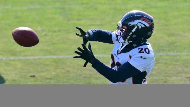 Aug 14, 2020; Englewood, Colorado, USA; Denver Broncos cornerback Duke Dawson Jr. (20) works out during training camp at the UCHealth Training Center. Mandatory Credit: Ron Chenoy-USA TODAY Sports  
