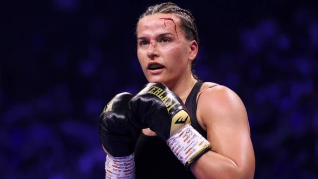  Chantelle Cameron looks on, as a cut on her forehead can be seen, during the IBF, IBO, WBA, WBC and WBO World Super Lightweight Title fight between her and Katie Taylor at The 3Arena Dublin. Trainer Jamie Moore and Cameron have called it quits. JAMES CHANCE/GETTY IMAGES.