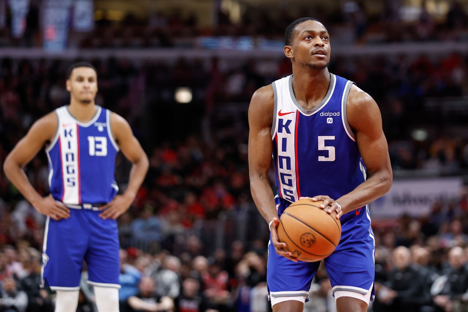 Feb 3, 2024; Chicago, Illinois, USA; Sacramento Kings guard De'Aaron Fox (5) shoots a free throw against the Chicago Bulls during the second half at United Center. Mandatory Credit: Kamil Krzaczynski-USA TODAY Sports  