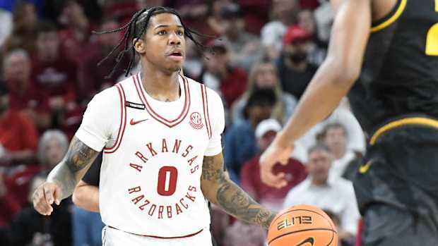Razorbacks' Khalif Battle brings ball upcourt against Missouri
