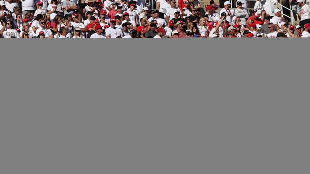 Sep 23, 2023; Salt Lake City, Utah, USA; A Utah Utes fan waves a flag during a second half break in action against the UCLA Bruins at Rice-Eccles Stadium. Mandatory Credit: Rob Gray-USA TODAY Sports