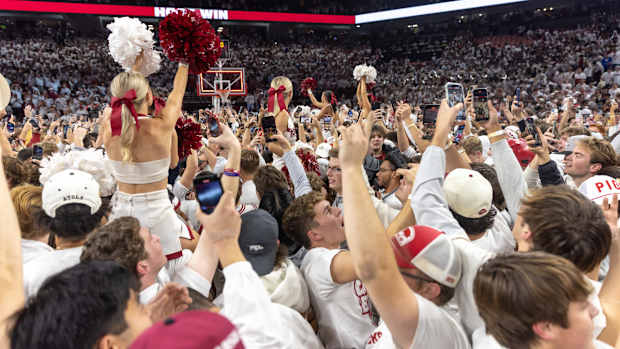 Razorback fans celebrating win over Duke in November 2023