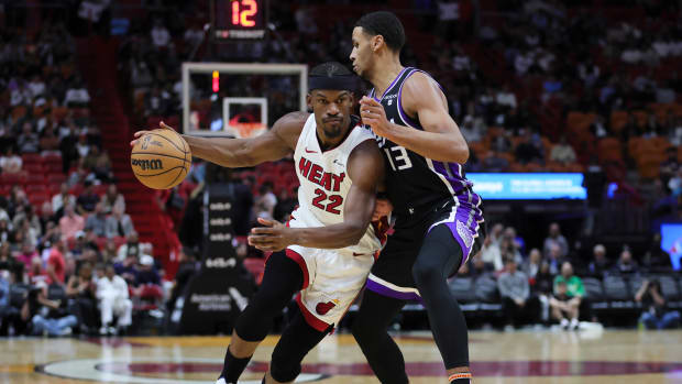Jan 31, 2024; Miami, Florida, USA; Miami Heat forward Jimmy Butler (22) drives to the basket against Sacramento Kings forward Keegan Murray (13) during the third quarter during the third quarter at Kaseya Center. Mandatory Credit: Sam Navarro-USA TODAY Sports  