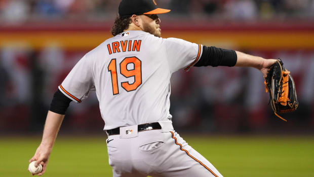Sep 1, 2023; Phoenix, Arizona, USA; Baltimore Orioles starting pitcher Cole Irvin (19) pitches against the Arizona Diamondbacks during the first inning at Chase Field. Mandatory Credit: Joe Camporeale-USA TODAY Sports