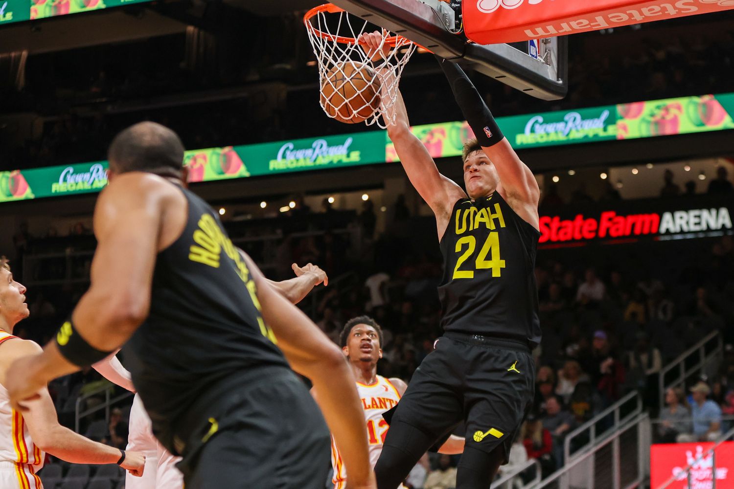 Feb 27, 2024; Atlanta, Georgia, USA; Utah Jazz center Walker Kessler (24) dunks against the Atlanta Hawks in the second half at State Farm Arena. Mandatory Credit: Brett Davis-USA TODAY Sports