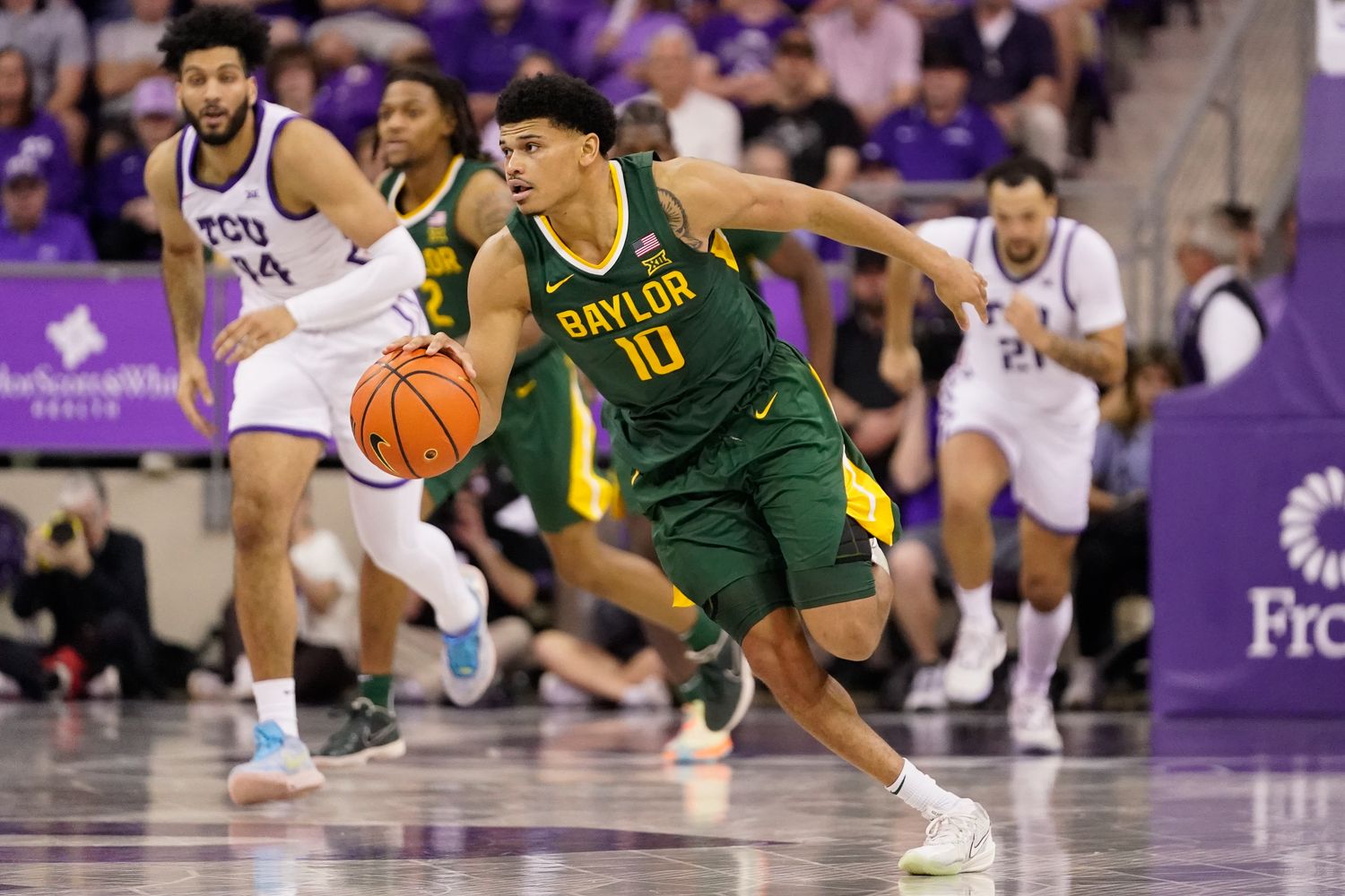 Feb 26, 2024; Fort Worth, Texas, USA; Baylor Bears guard RayJ Dennis (10) dribbles against the TCU Horned Frogs during the second half at Ed and Rae Schollmaier Arena.