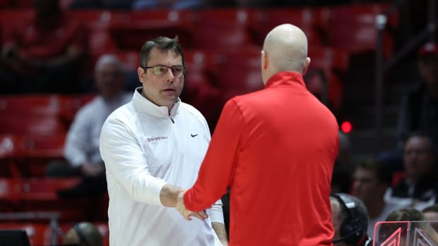 Feb 29, 2024; Salt Lake City, Utah, USA; Stanford Cardinal head coach Jerod Haase shakes hands with Utah Utes head coach Craig Smith after the game at Jon M. Huntsman Center. Mandatory Credit: Rob Gray-USA TODAY Sports