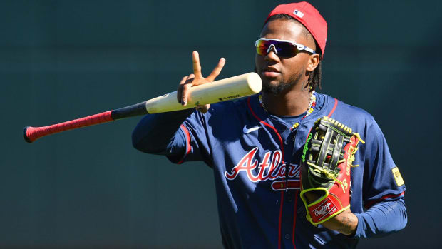 Ronald Acuna warms up prior to a spring training game.
