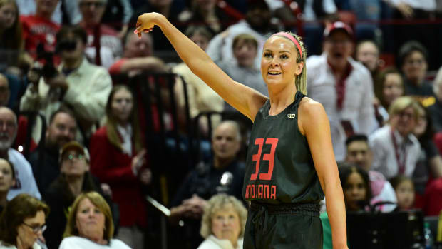 Feb 22, 2024; Bloomington, Indiana, USA; Indiana Hoosiers guard Sydney Parrish (33) reacts to making a shot during the second half against the Iowa Hawkeyes at Simon Skjodt Assembly Hall.