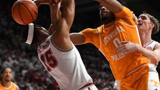 Mar 2, 2024; Tuscaloosa, Alabama, USA; Alabama forward Jarin Stevenson (15) and Tennessee forward Jonas Aiddo (0) fight for a rebound that gets knocked out of bounds at Coleman Coliseum. Mandatory Credit: Gary Cosby Jr.-USA TODAY Sports