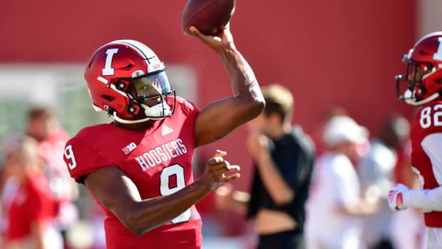Indiana Hoosiers quarterback Michael Penix Jr. (9) warms up before the game against the Cincinnati Bearcats at Memorial Stadium.