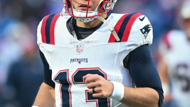 Dec 31, 2023; Orchard Park, New York, USA; New England Patriots quarterback Nathan Rourke (13) enters the field before a game Buffalo Bills at Highmark Stadium. Mandatory Credit: Mark Konezny-USA TODAY Sports  