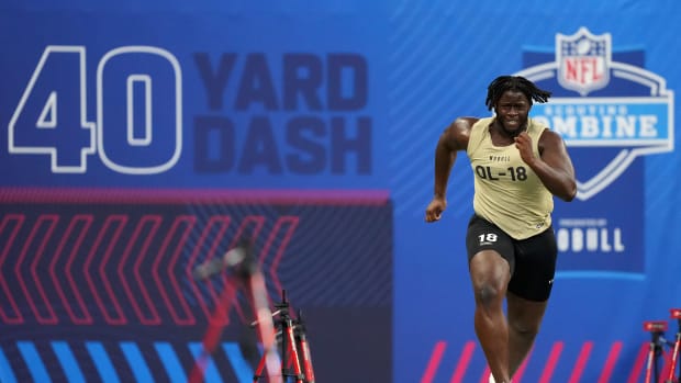 Penn State offensive lineman Olu Fashanu runs the 40-yard dash at the 2024 NFL Scouting Combine in Indianapolis.