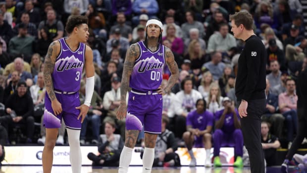 Jan 18, 2024; Salt Lake City, Utah, USA; Utah Jazz guard Keyonte George (3) and guard Jordan Clarkson (00) and head coach Will Hardy talk during a stop in play during the second half against the Oklahoma City Thunder at Delta Center. Mandatory Credit: Chris Nicoll-USA TODAY Sports