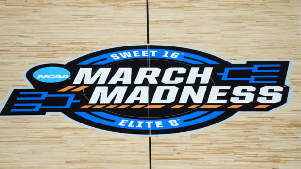 A general overall view of the March Madness Sweet 16 and Elite 8 logo at center court at Climate Pledge Arena.