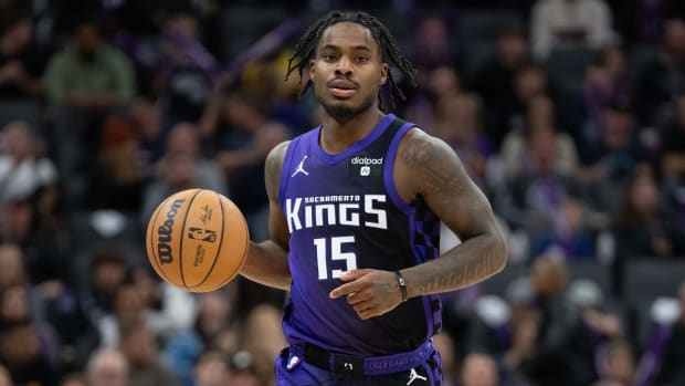 December 16, 2023; Sacramento, California, USA; Sacramento Kings guard Davion Mitchell (15) dribbles the basketball during the fourth quarter against the Utah Jazz at Golden 1 Center. Mandatory Credit: Kyle Terada-USA TODAY Sports