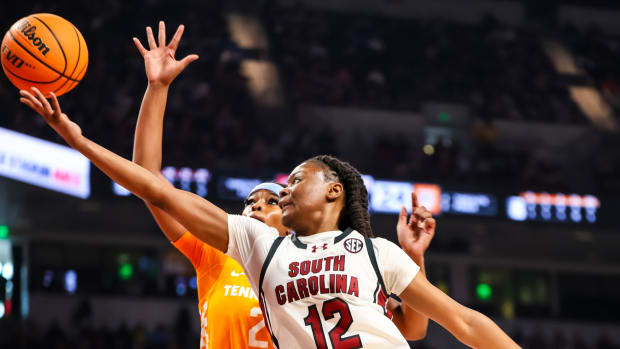 Mar 3, 2024; Columbia, South Carolina, USA; South Carolina Gamecocks guard MiLaysia Fulwiley (12) drives past Tennessee Lady Vols center Tamari Key (20) in the first half at Colonial Life Arena. 