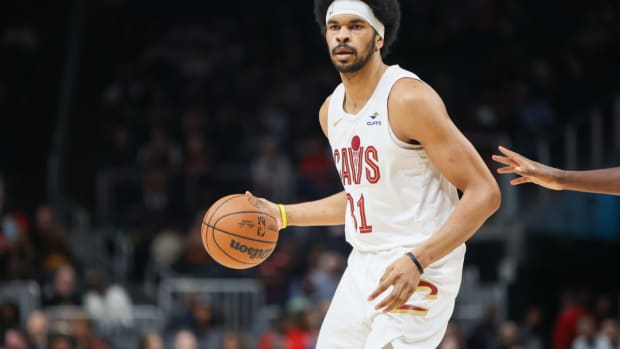 Mar 6, 2024; Atlanta, Georgia, USA; Cleveland Cavaliers center Jarrett Allen (31) handles the ball against the Atlanta Hawks in the first quarter at State Farm Arena.