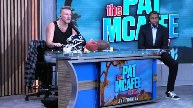 Feb 9, 2023; Phoenix, AZ, USA; Pat McAfee (left) interviews Stephen A. Smith on the FanDuel set on radio row at the Super Bowl LVII media center at the Phoenix Convention Center.