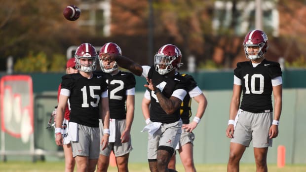 Quarterback Jalen Milroe throws during practice for the Alabama Crimson Tide football team Wednesday