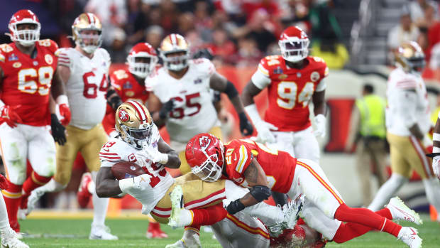 Feb 11, 2024; Paradise, Nevada, USA; San Francisco 49ers wide receiver Deebo Samuel (19) is tackled by Kansas City Chiefs safety Justin Reid (20) in the first half in Super Bowl LVIII at Allegiant Stadium. Mandatory Credit: Mark J. Rebilas-USA TODAY Sports  