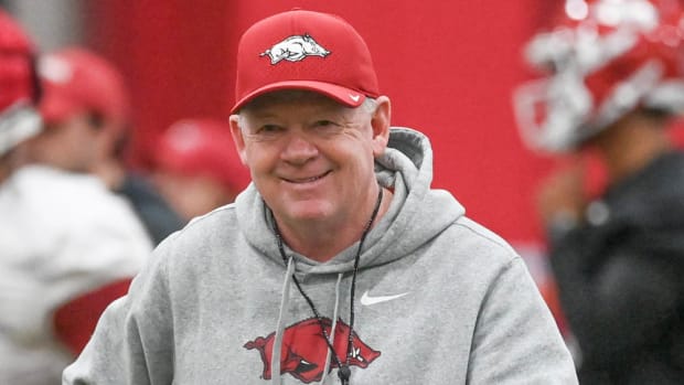 New Razorbacks offensive coordinator Bobby Petrino at practice Thursday