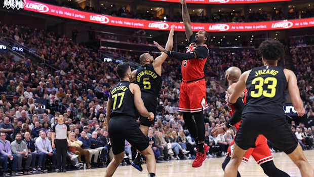Chicago Bulls center Andre Drummond (3) shoots over Utah Jazz guard Talen Horton-Tucker (5) during the third quarter at Delta Center.