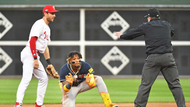 Oct 11, 2023; Philadelphia, Pennsylvania, USA; Atlanta Braves right fielder Ronald Acuna Jr. (13) slides into second base for a double during the third inning against the Philadelphia Phillies in game three of the NLDS for the 2023 MLB playoffs at Citizens Bank Park. Mandatory Credit: Eric Hartline-USA TODAY Sports  
