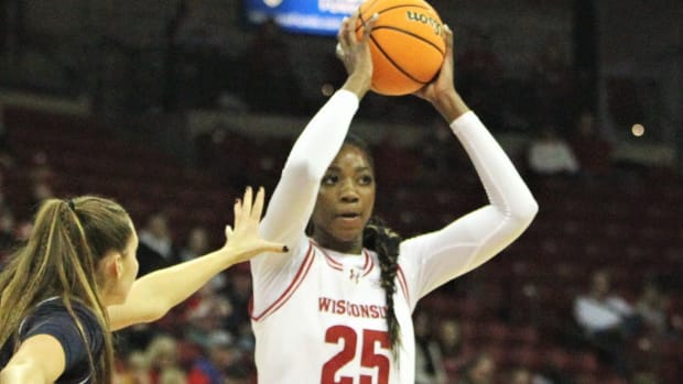 Wisconsin's Serah Williams looks to make a pass against Butler on Sunday Dec. 3, 2023 at the Kohl Center in Madison, Wisconsin.